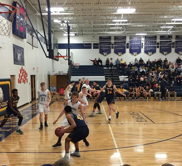 Charlie Jacob on the Totino-Grace Eagles with the ball.