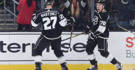 LOS ANGELES, CA - DECEMBER 9:  Tanner Pearson #70 of the Los Angeles Kings celebrates with Alec Martinez #27 after scoring the game-winning goal in overtime against the Carolina Hurricanes at STAPLES Center on December 9, 2017 in Los Angeles, California. (Photo by Adam Pantozzi/NHLI via Getty Images)